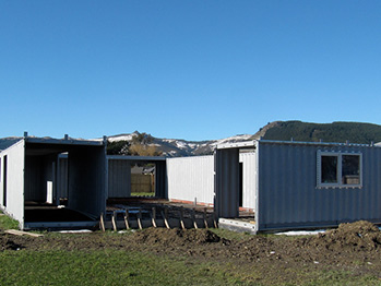 Containers in place with custom windows and door opening. Source: kuziel.nz